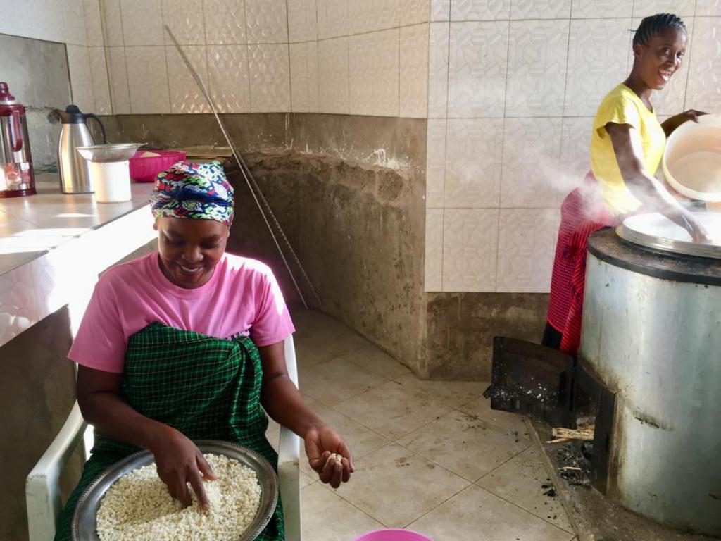 Cooks preparing food in the community center kitchen