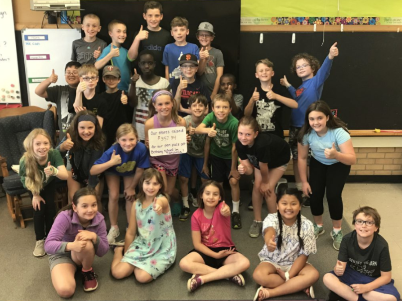 Falcon Heights Elementary School 4th grade class gives their craft sale proceeds to the Bethany Pre and Primary School in Tanzania.